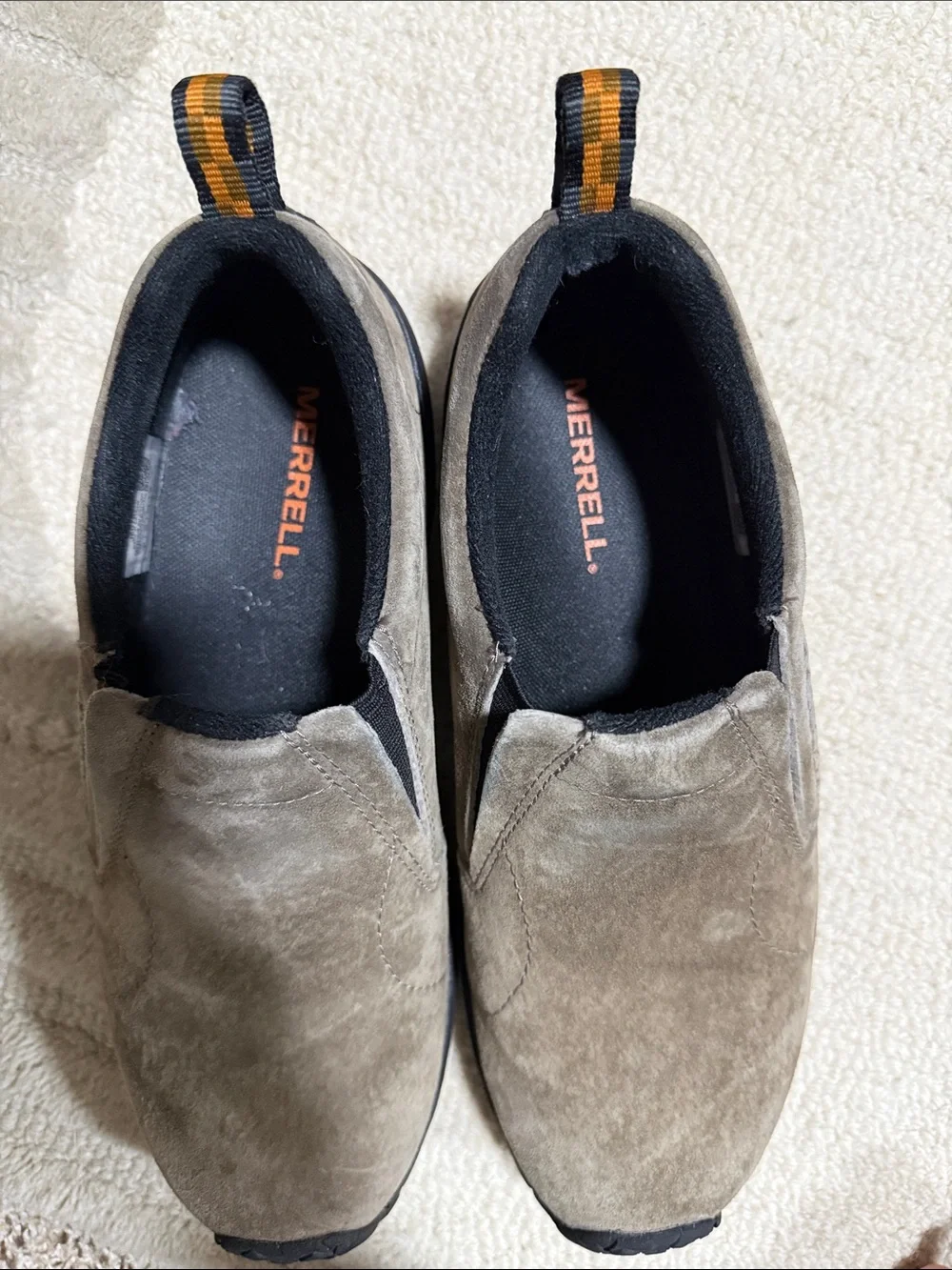 Merrell Men's Taupe Suede Slip-On Loafers with Black Trim and Orange Pull Tabs